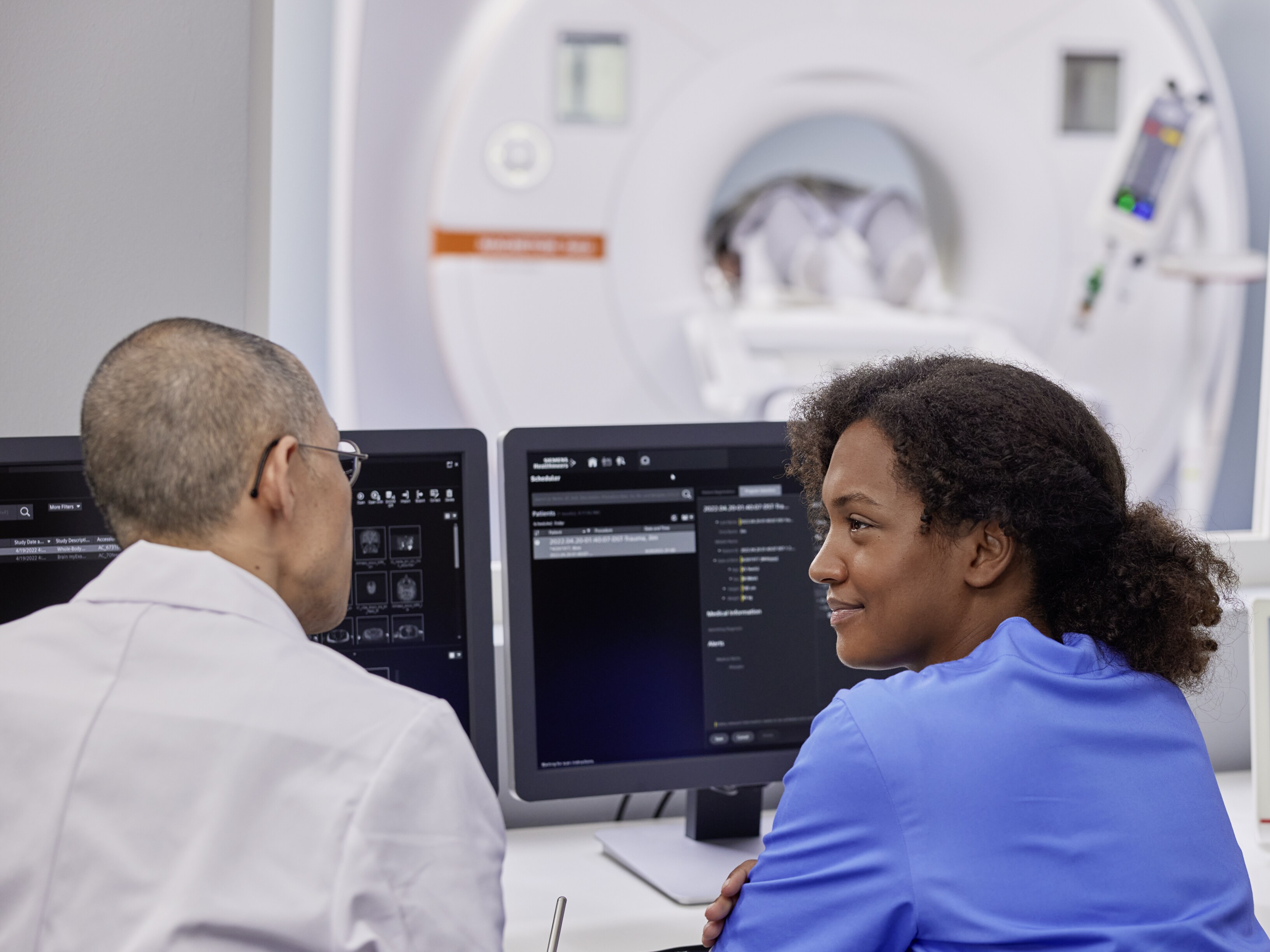Image showing two radiologists engaged in a discussion