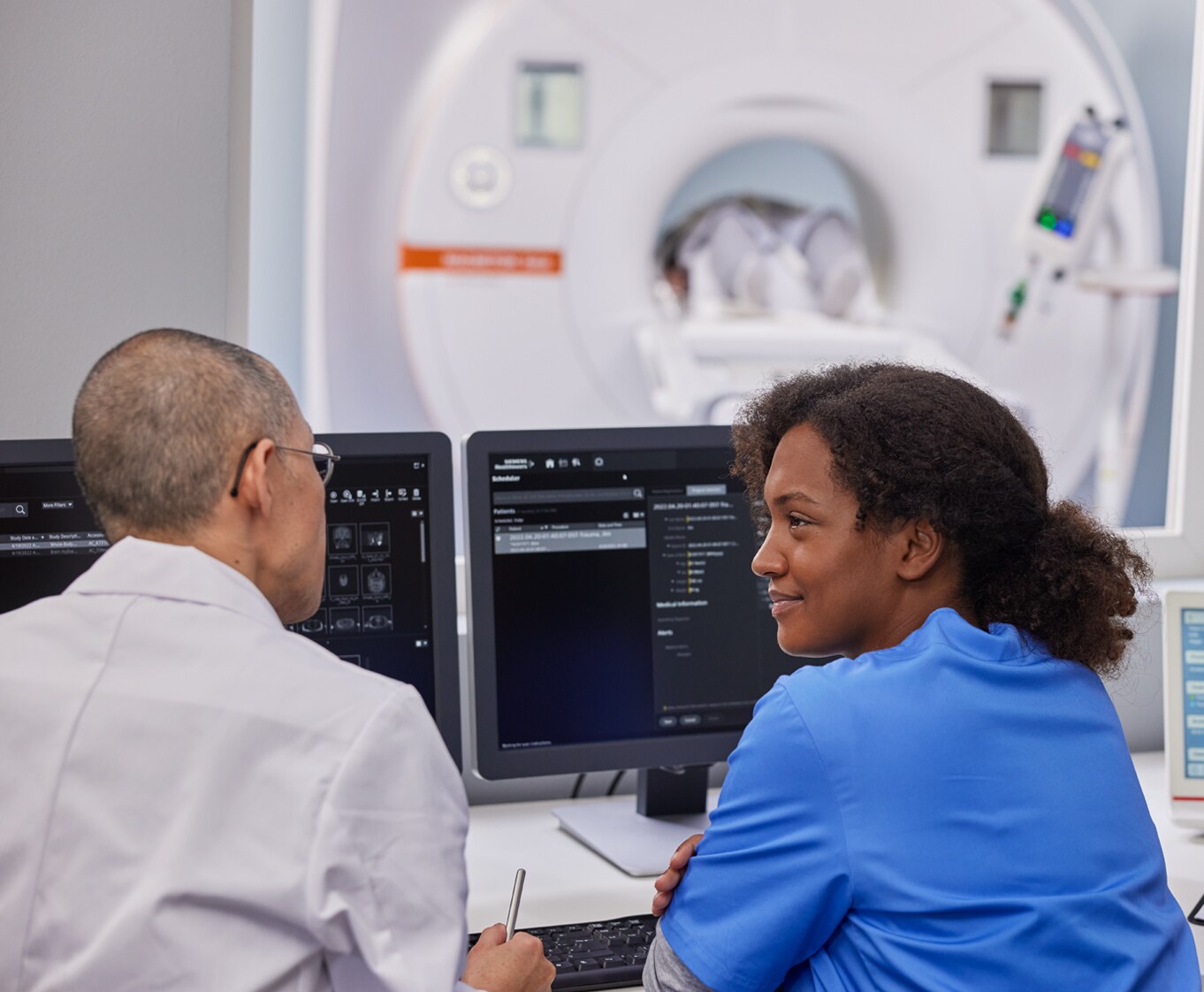Image showing two radiologists engaged in a discussion