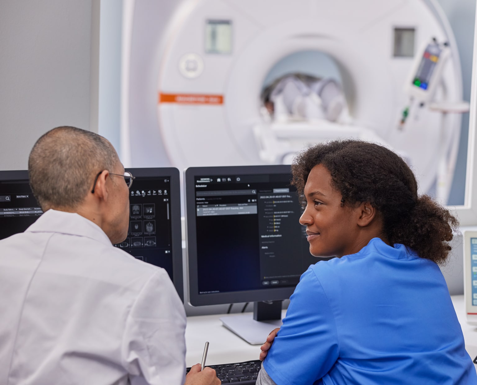 Image showing two radiologists engaged in a discussion